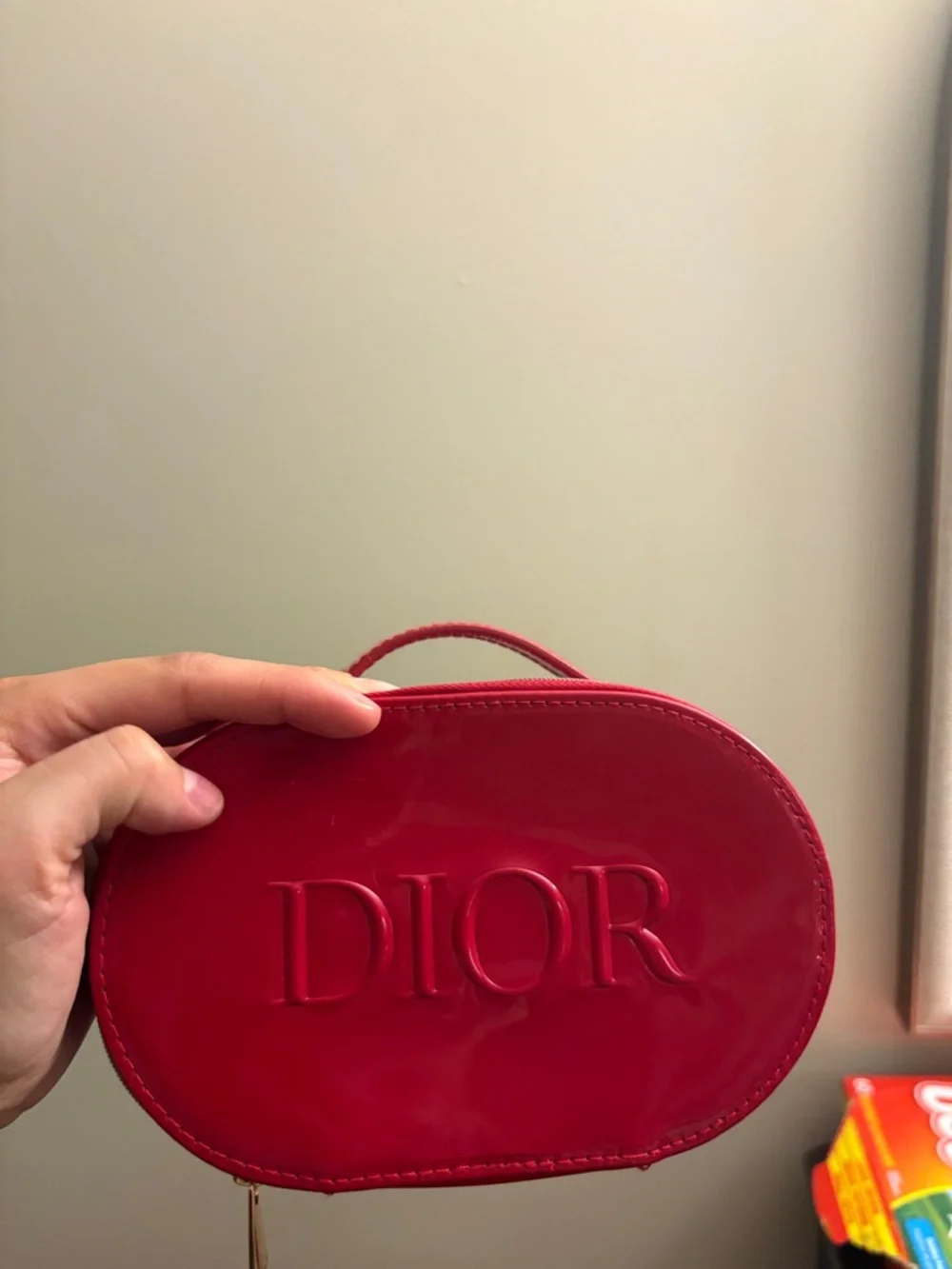 Dior Red Patent Oval Cosmetic Case with Embossed Logo